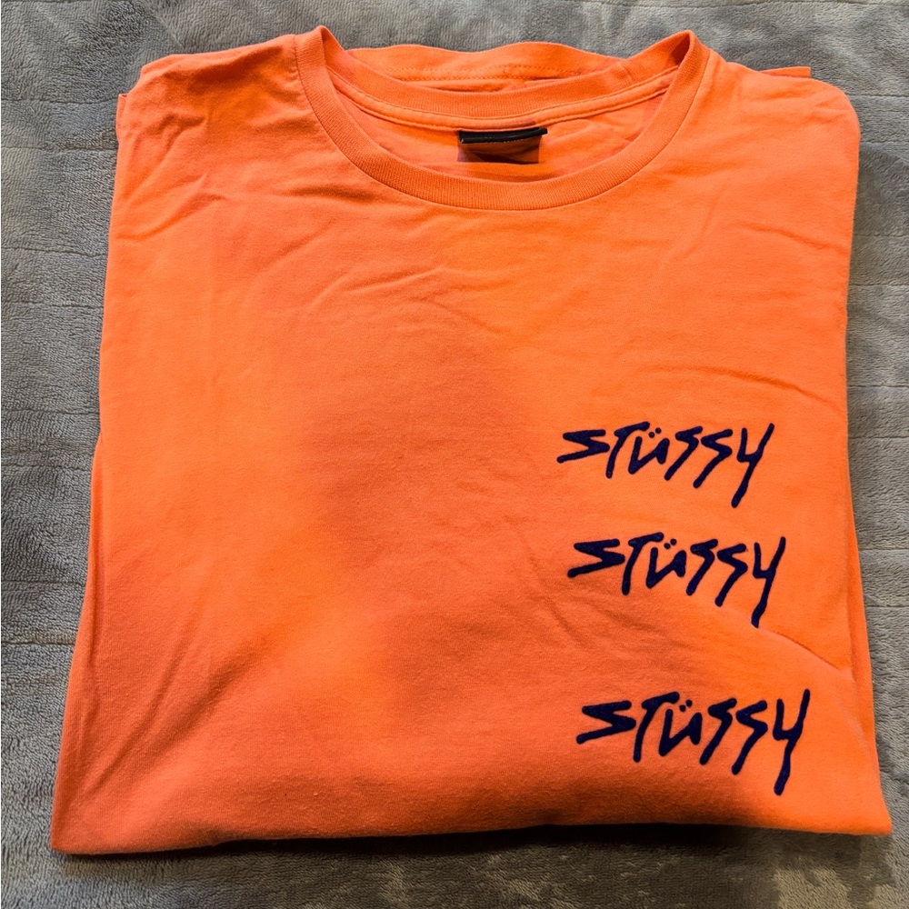 Stussy Orange Long Sleeve Tee with Purple Logo